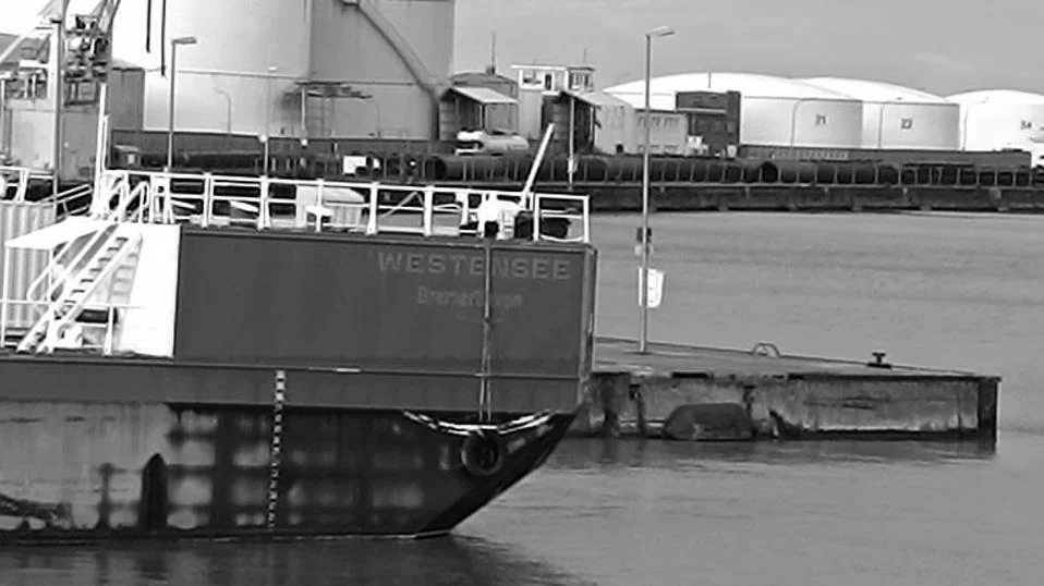 Commercial vessel at an industrial port